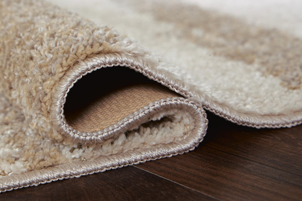Jerrlow Beige/Brown/Gray Washable Medium Rug — detail view