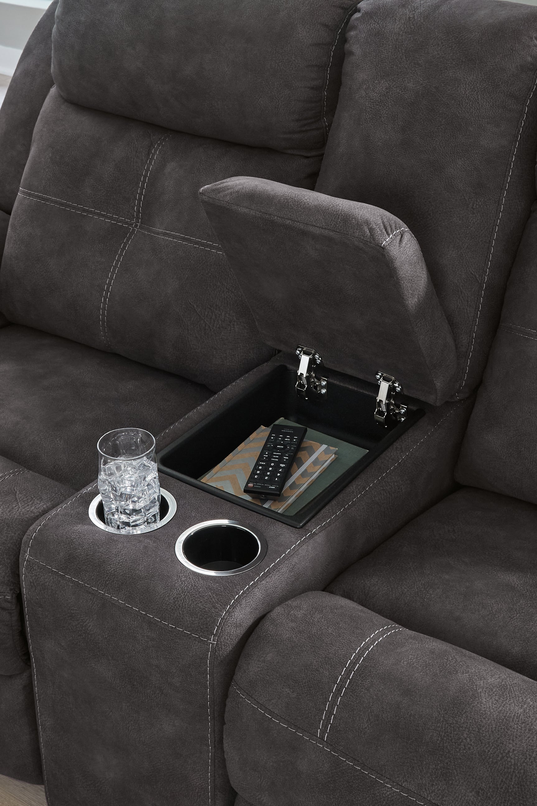 Brysonview Charcoal Faux Leather Reclining Loveseat with Console