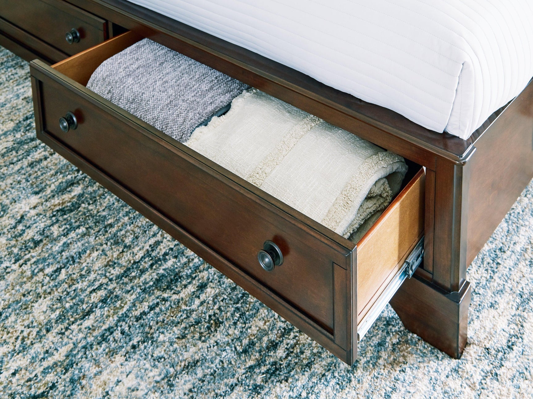 Trellington Brown King Sleigh Storage Bed