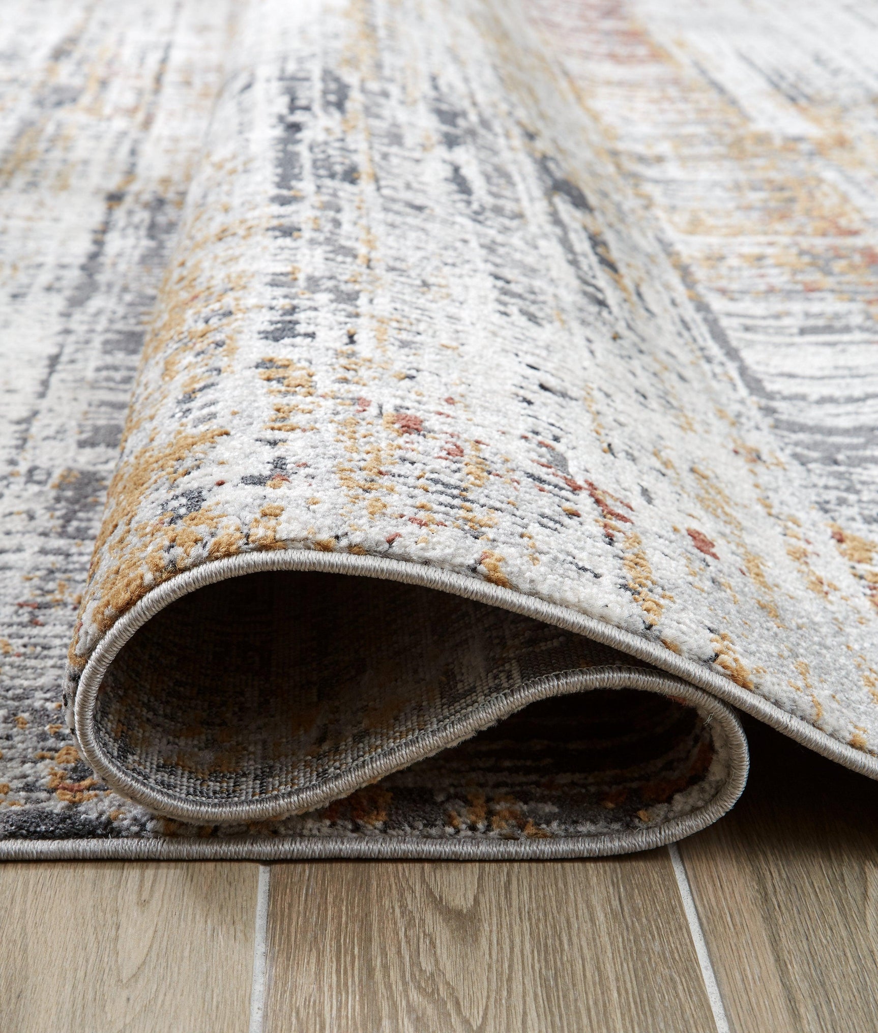 Rhettner Multi 5'3" x 7'3" Contemporary Area Rug