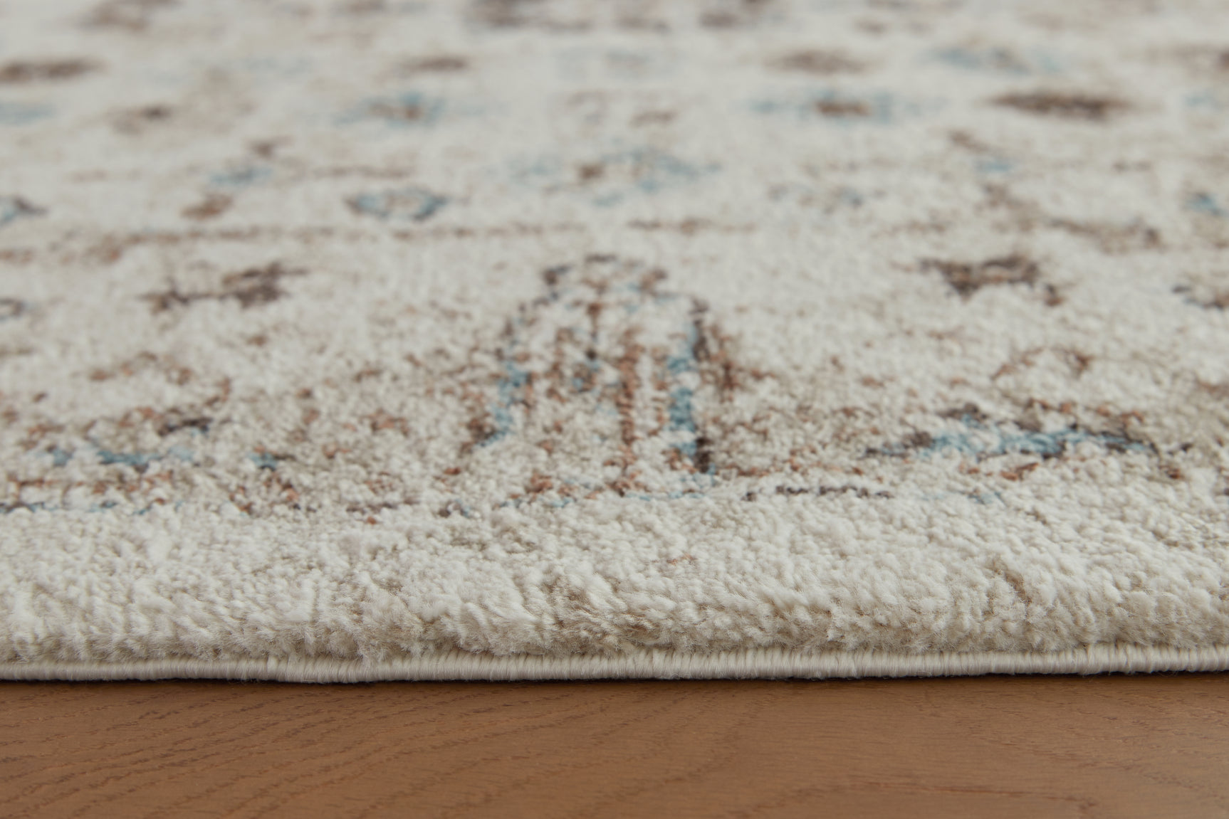 Jossler Ivory/Brown/Teal 5' x 7' Rug