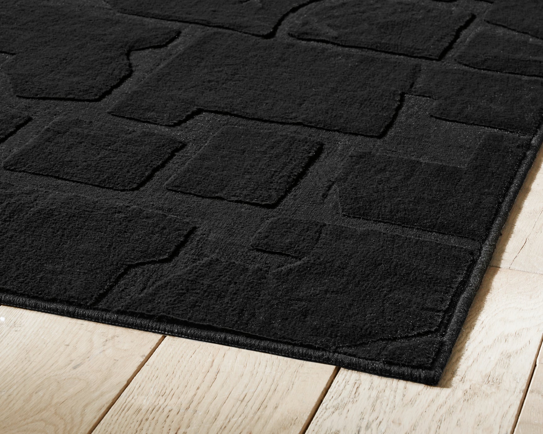 Gibbswell Black Washable 8' x 10' Area Rug