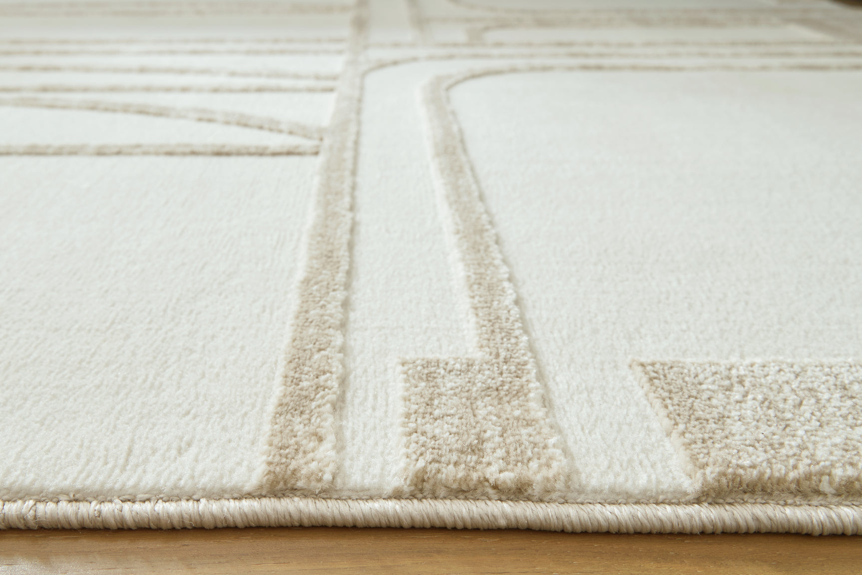 Farongrove Ivory/Beige 7'10" x 10' Area Rug