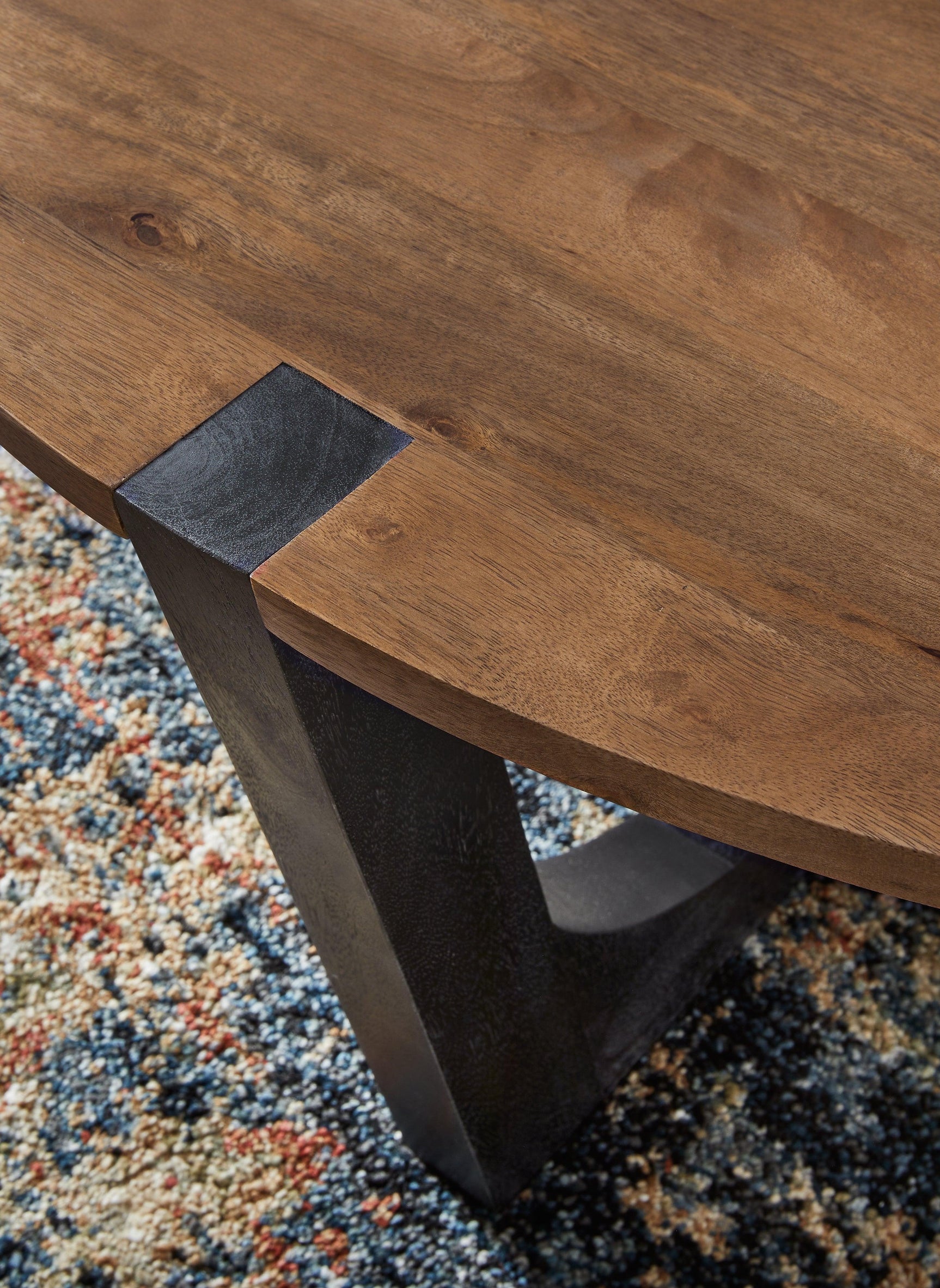 Hanneforth Round Mango Wood Coffee Table in Brown and Black
