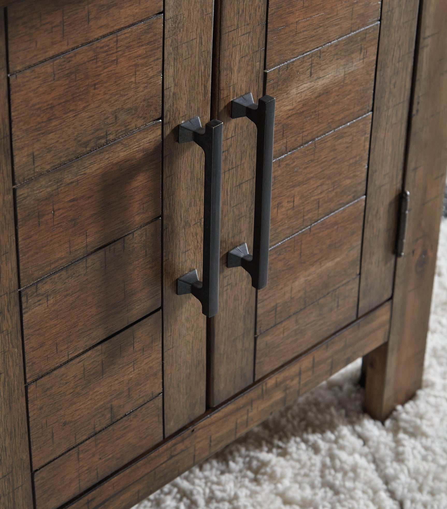 Moriville Grayish Brown End Table with Dual Cabinet Doors