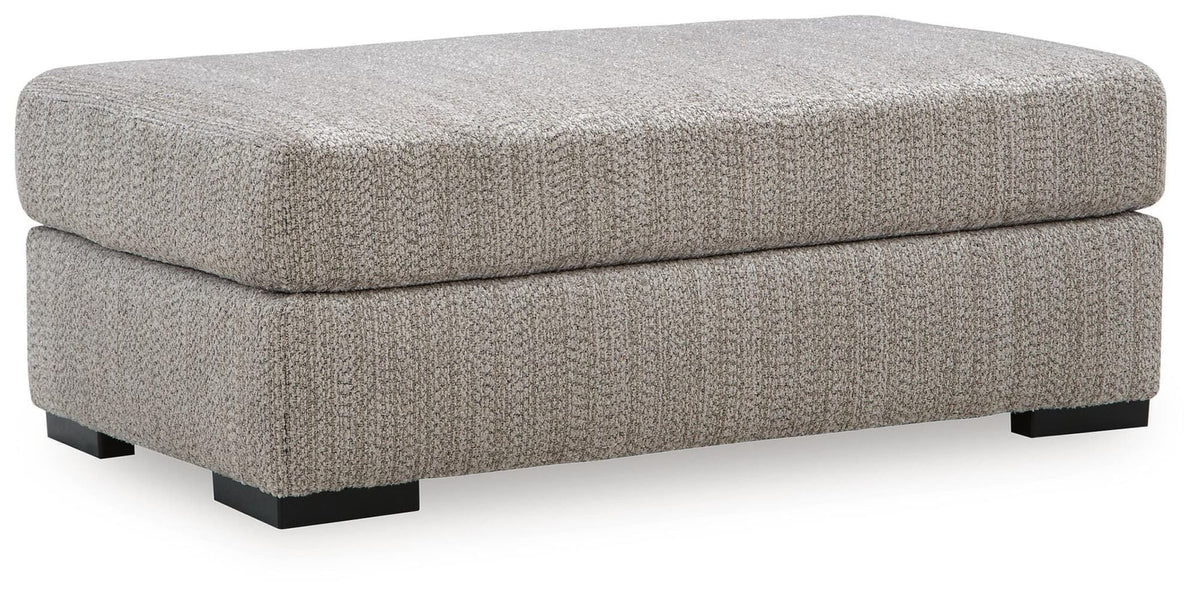 Lofwood Fossil Chenille Ottoman — angled view