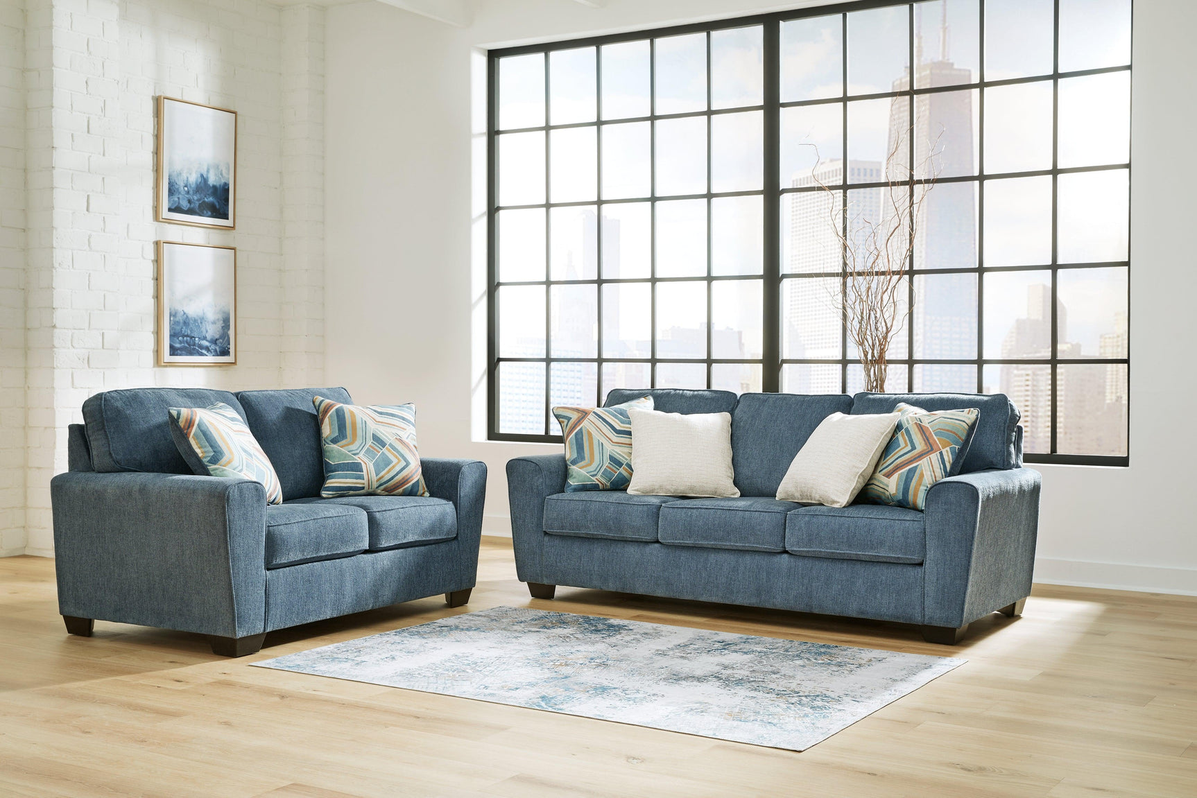 Cashton Blue Sofa, Loveseat, Chair And Ottoman - Ella Furniture