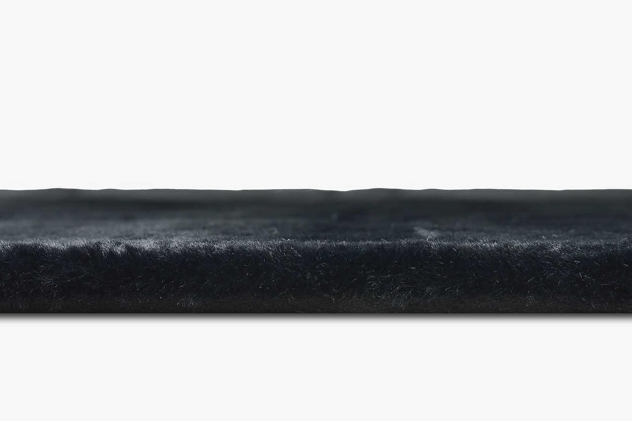 Rabbit Black Area Rug