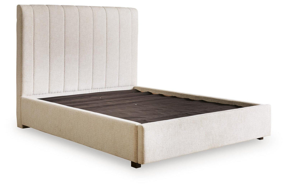 Brizmore Beige Queen Upholstered Storage Bed — angled view