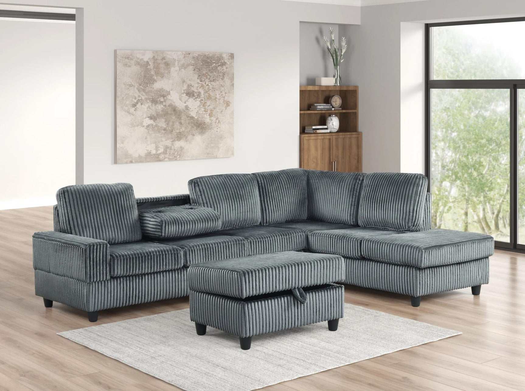 Heights Gray Reversible Sectional + Ottoman from Ella Furniture