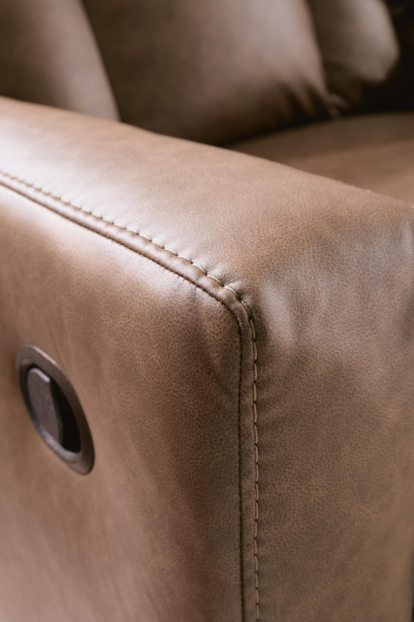 Mackmenville Caramel Faux Leather Recliner from Ella Furniture
