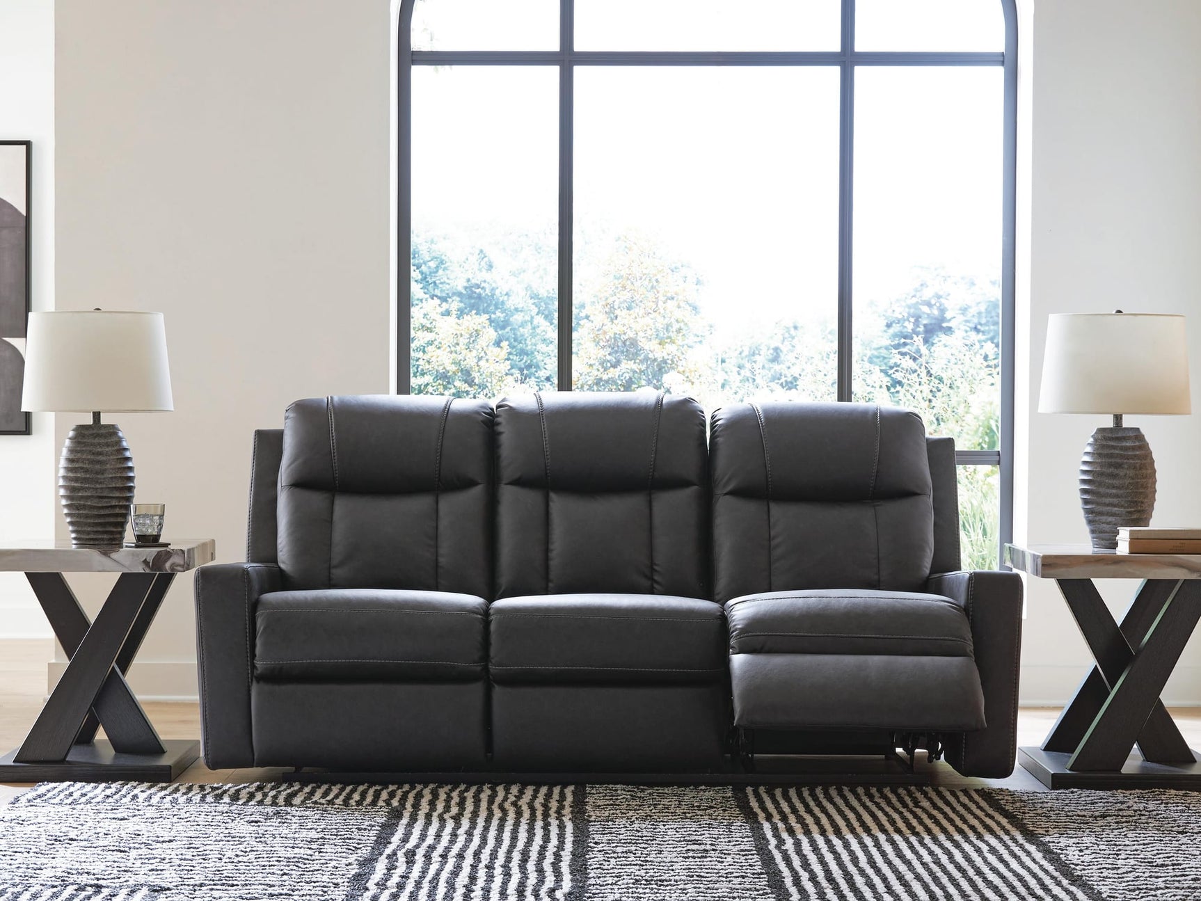 Mackmenville Carbon Faux Leather Reclining Sofa view 7