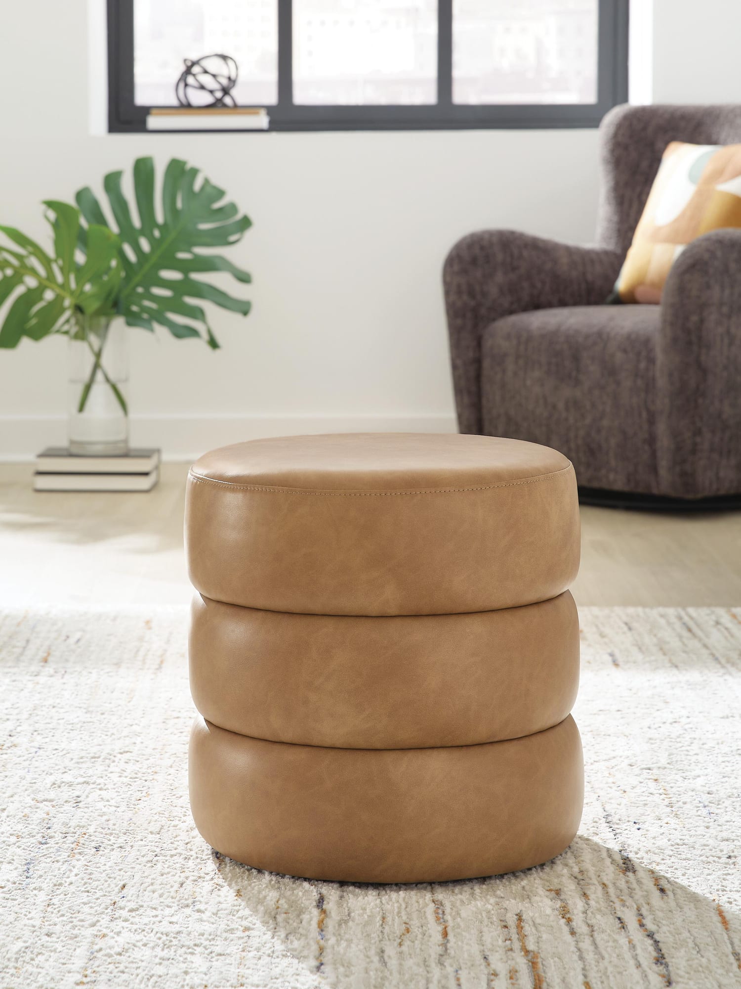 Ummi Caramel Swivel Accent Ottoman from Ella Furniture