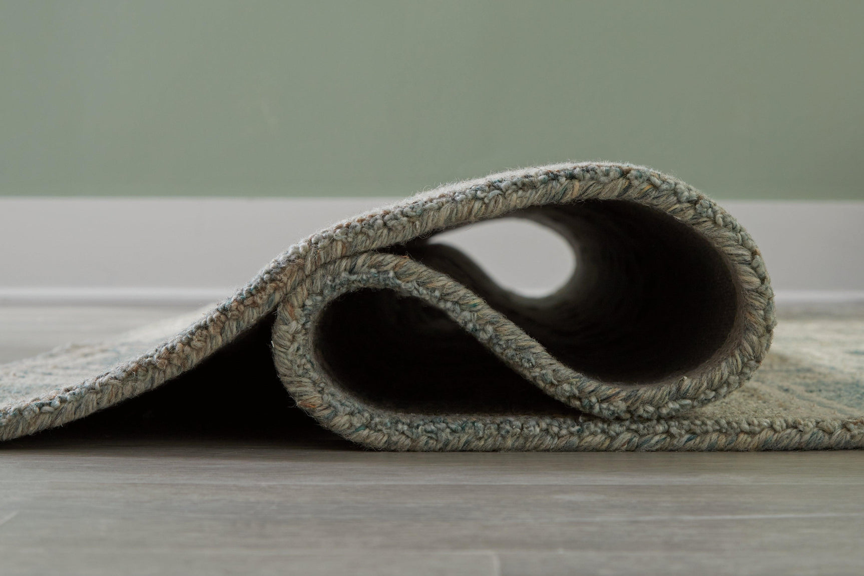 Jossland Green/Ivory Large Rug - Ella Furniture