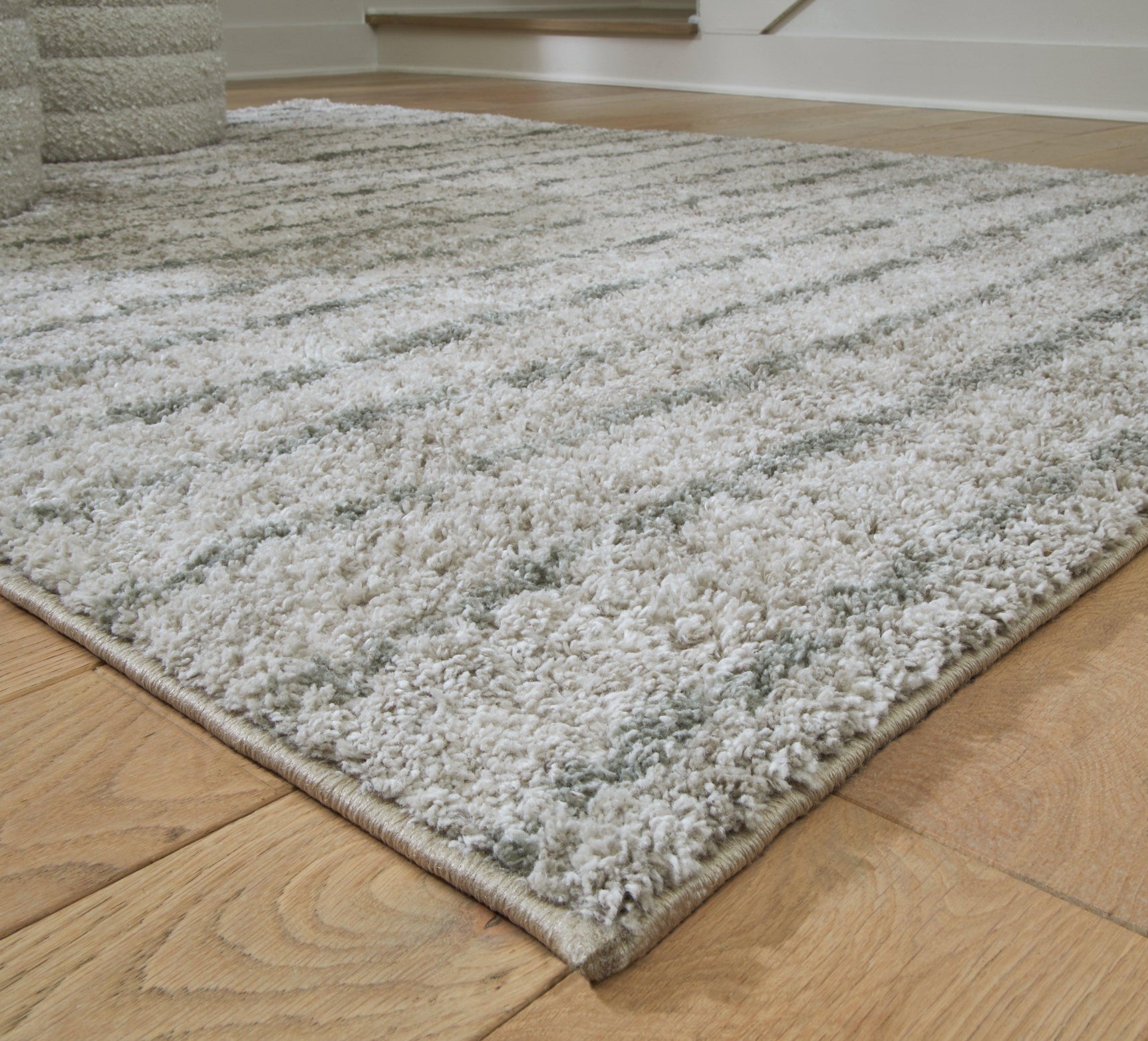 Laddway Cream/Green Medium Rug - Ella Furniture