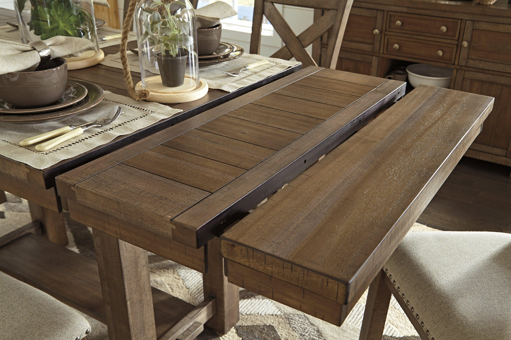 Moriville Grayish Brown Counter Height Dining Table And 4 Barstools - Ella Furniture