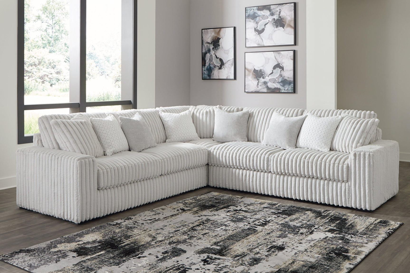 Stupendous Alloy 3-Piece Sectional with Ottoman - Ella Furniture
