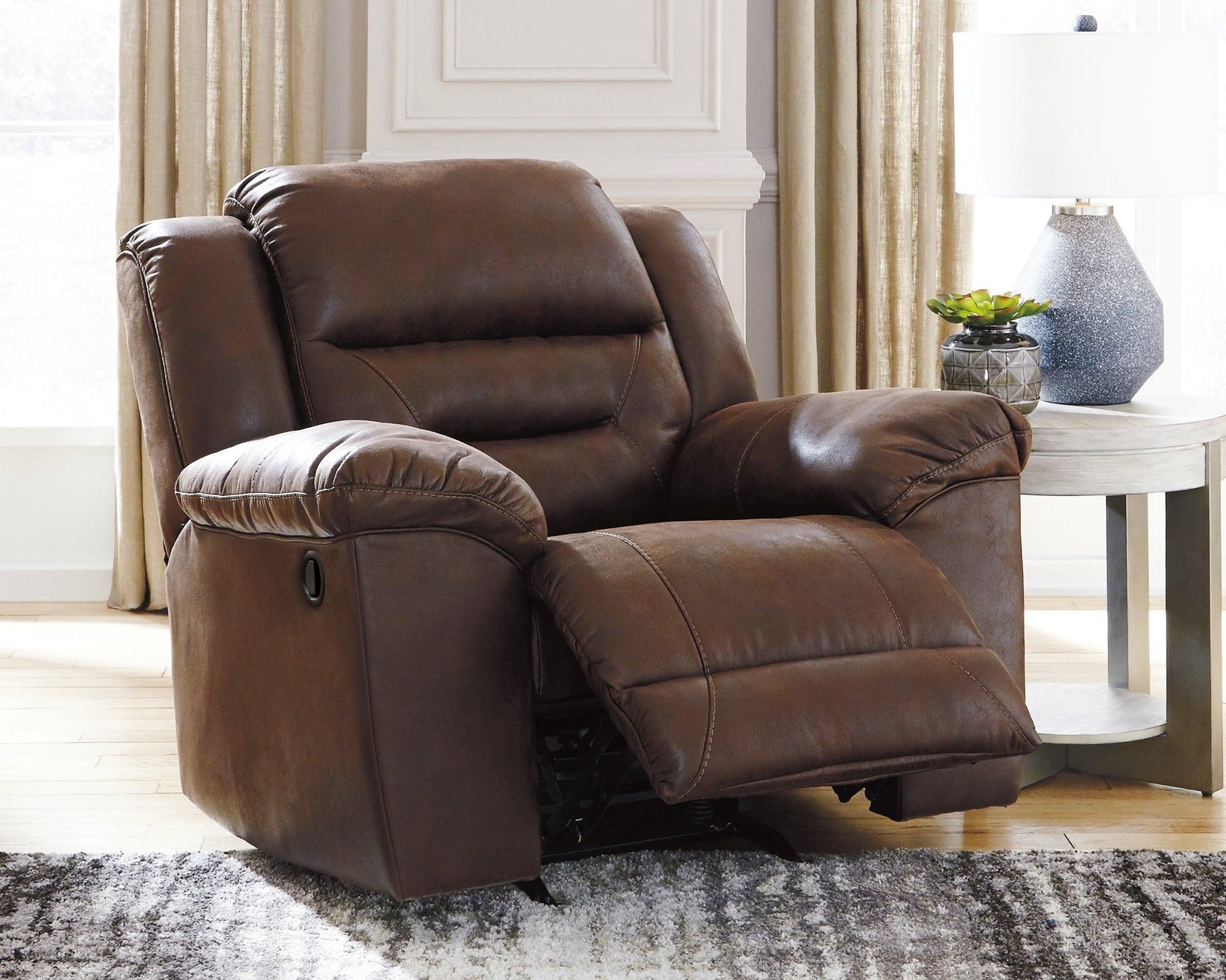 Stoneland Chocolate Faux Leather Recliner - Ella Furniture