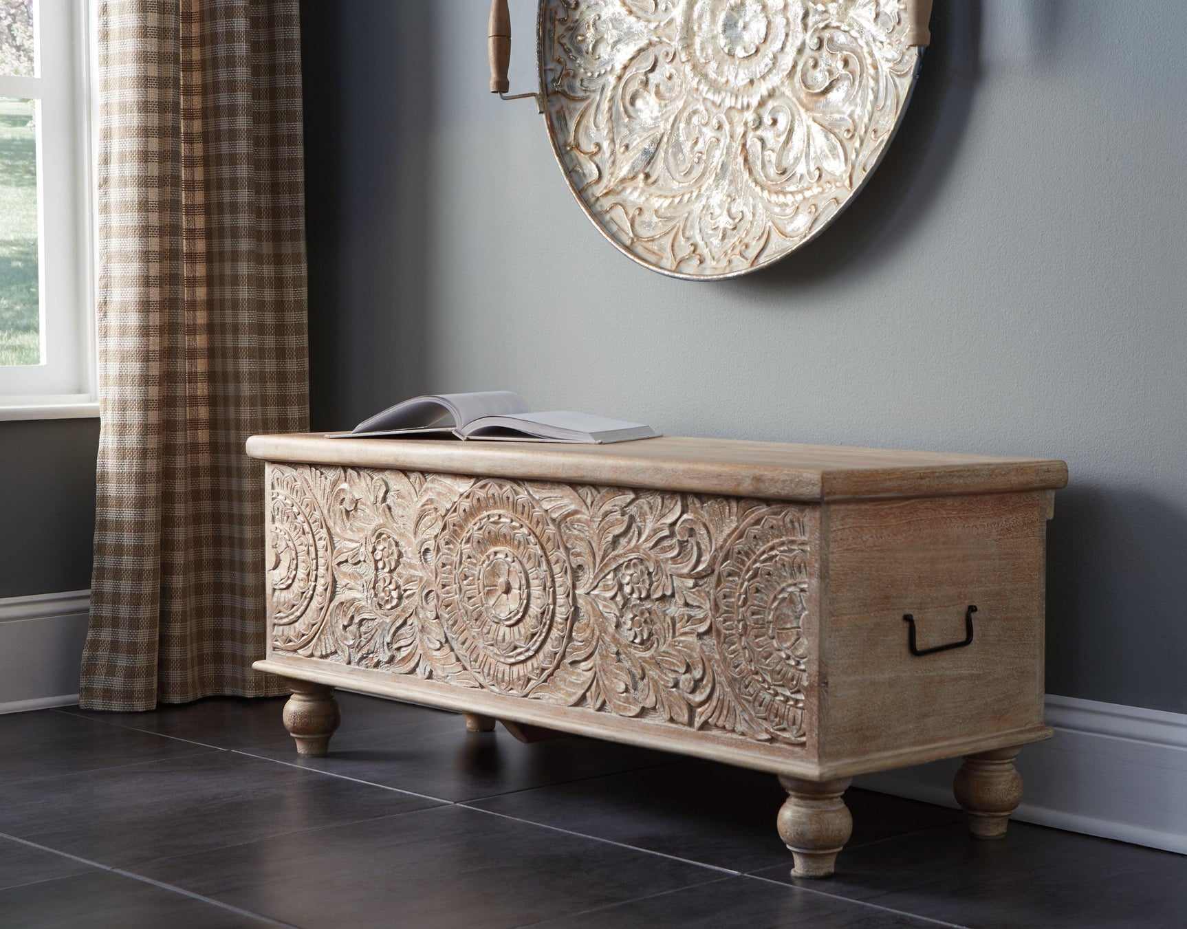 Fossil Ridge Storage Bench top view highlighting hand-carved medallions