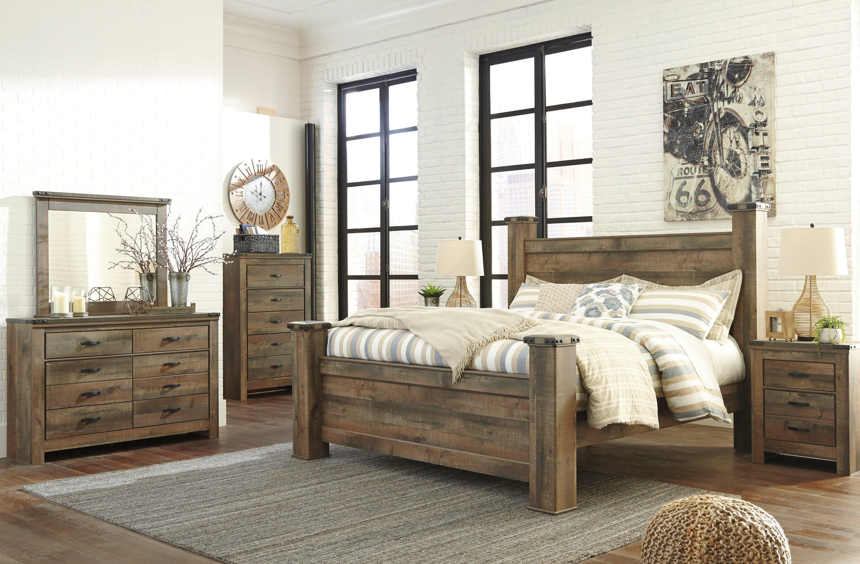 Trinell Brown King Poster Bed - Ella Furniture