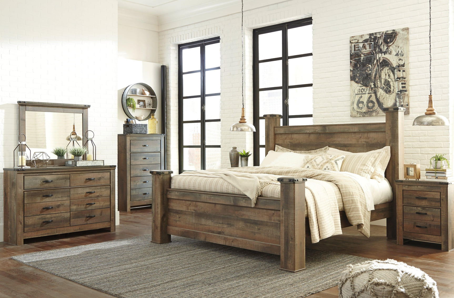 Trinell Brown King Poster Bed - Ella Furniture