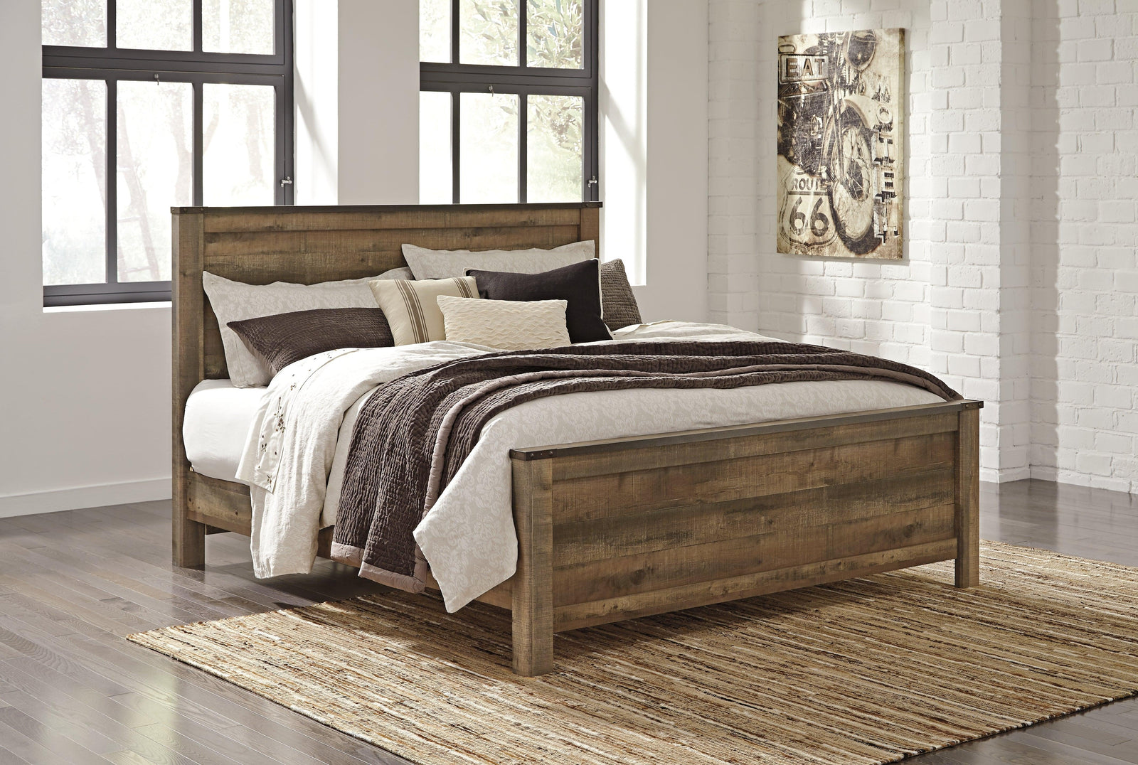 Trinell Brown King Panel Bed - Ella Furniture
