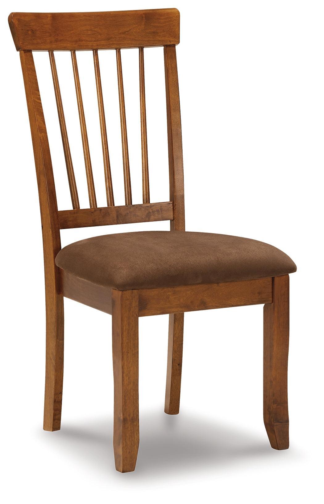 Close-up of the distressed brown finish on Berringer Dining Chair frame