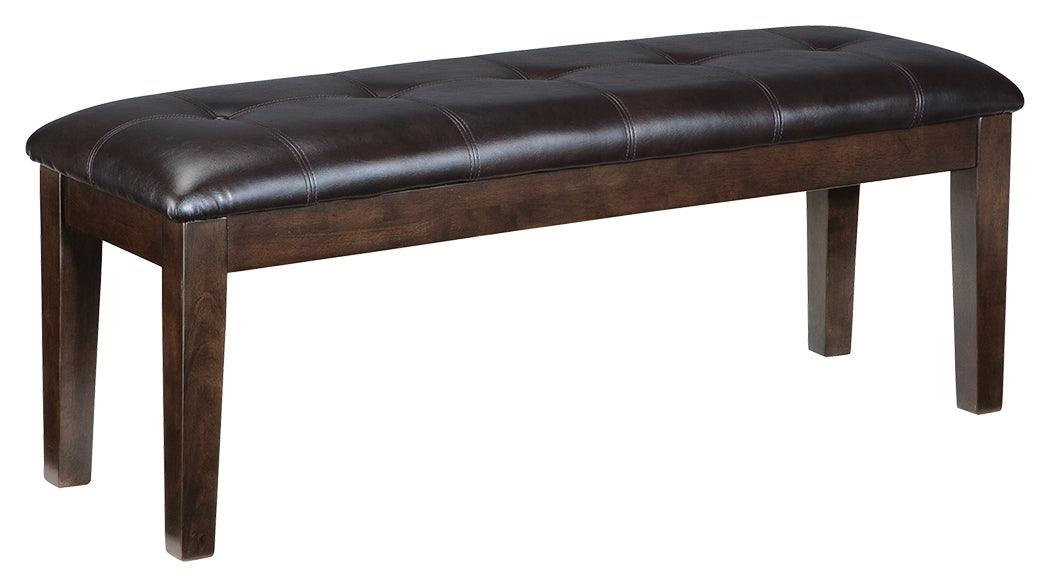 Close-up of button-tufted leather match upholstery on Haddigan bench