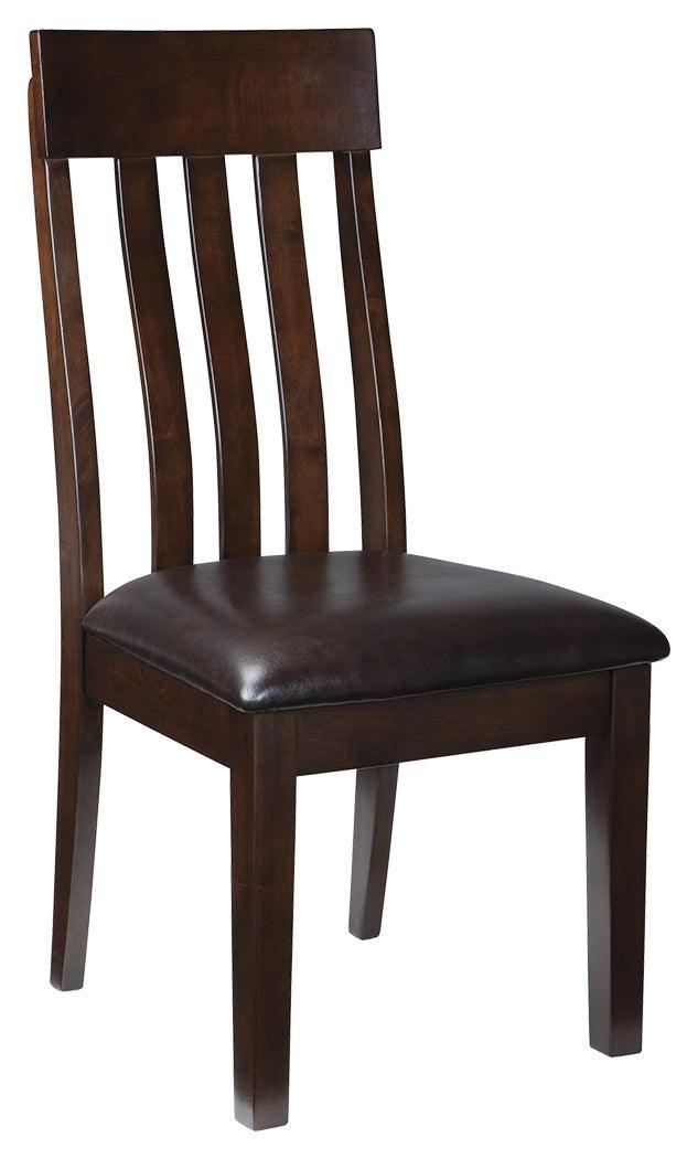 Haddigan dining chair side view highlighting armrests and rake-back design