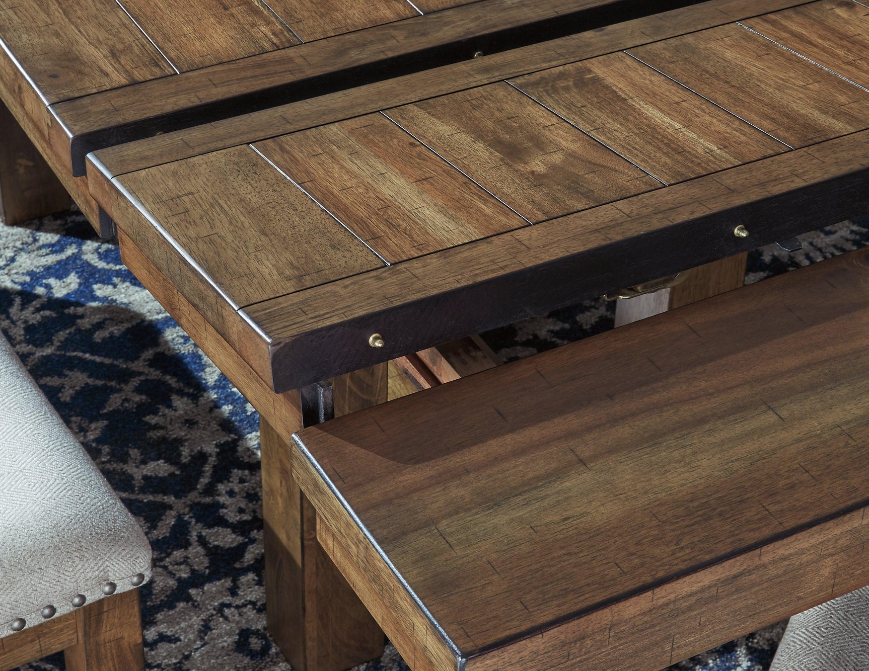 Moriville Grayish Brown Dining Extension Table - Ella Furniture