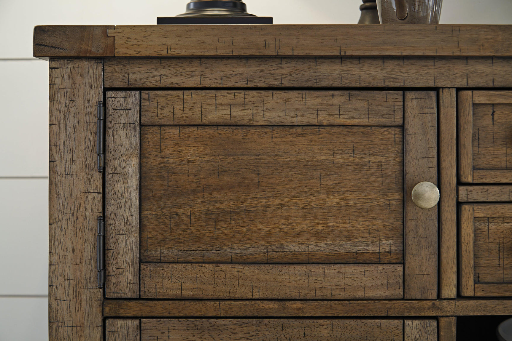 Moriville Dining Server distressed nutmeg finish detail