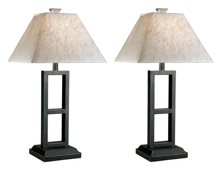 Pair of Deidra table lamps illuminated on console table