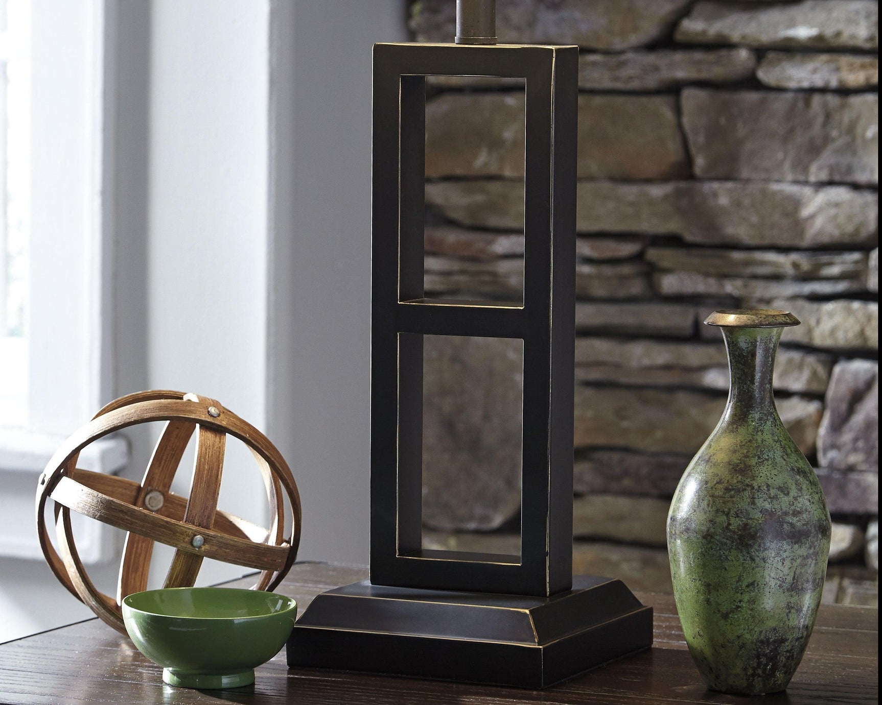 Deidra table lamp showing center cutout design on base