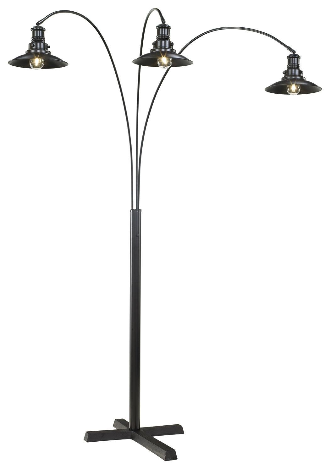 Sheriel floor lamp arching over modern sofa setup