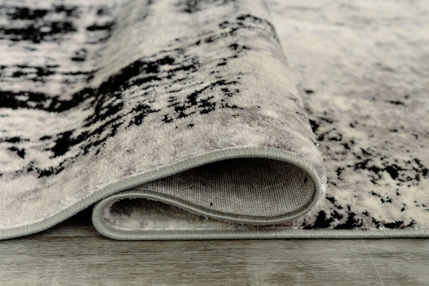 Zekeman Black/cream/gray 7'10" X 10' Rug - Ella Furniture