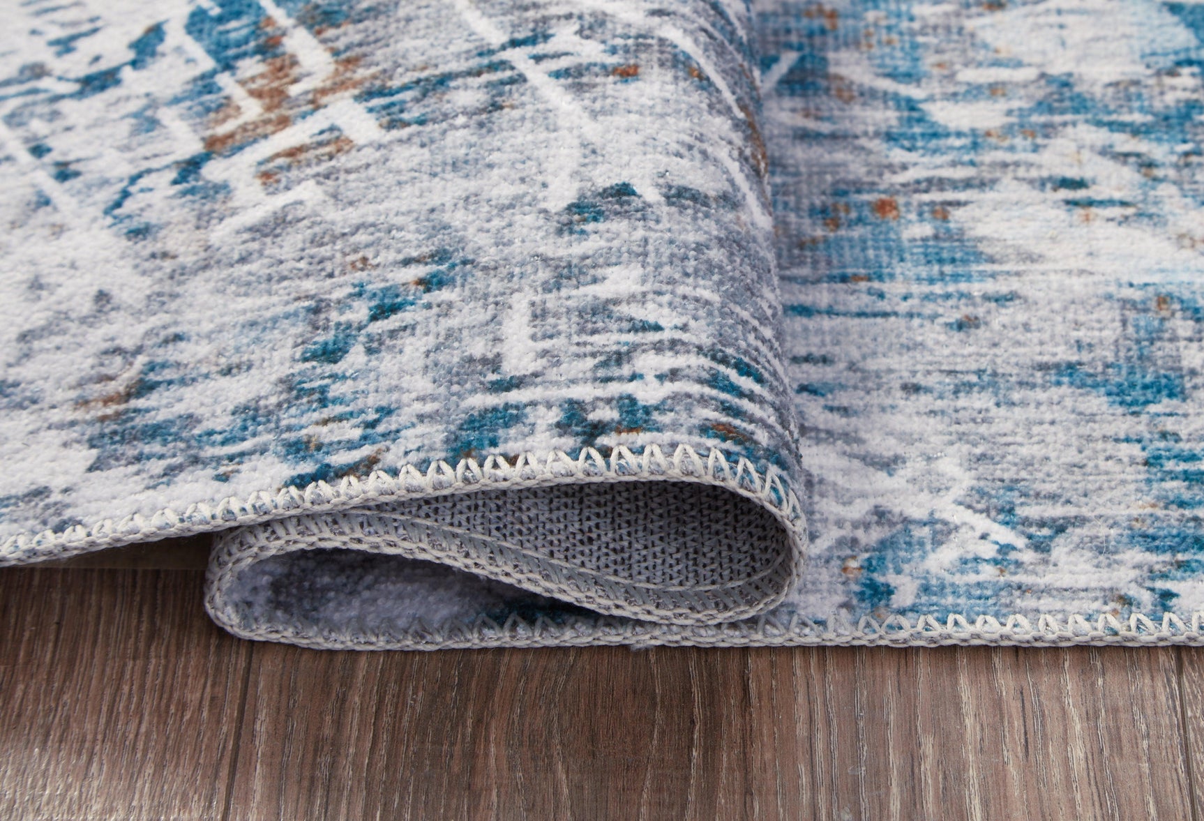Garyard Multi 5' X 7' Rug - Ella Furniture