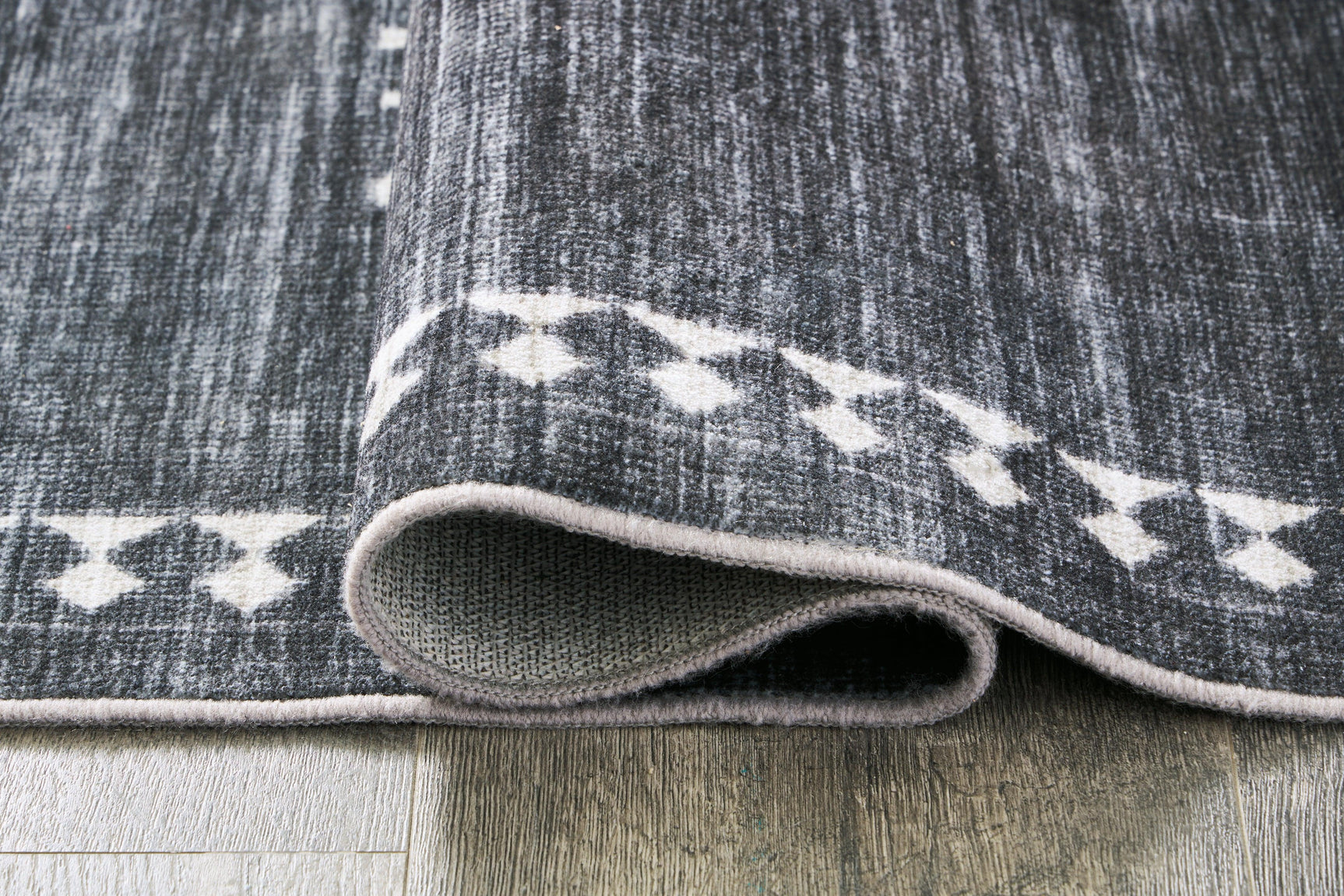 Arloman Black/cream/gray 5' X 7' Rug - Ella Furniture