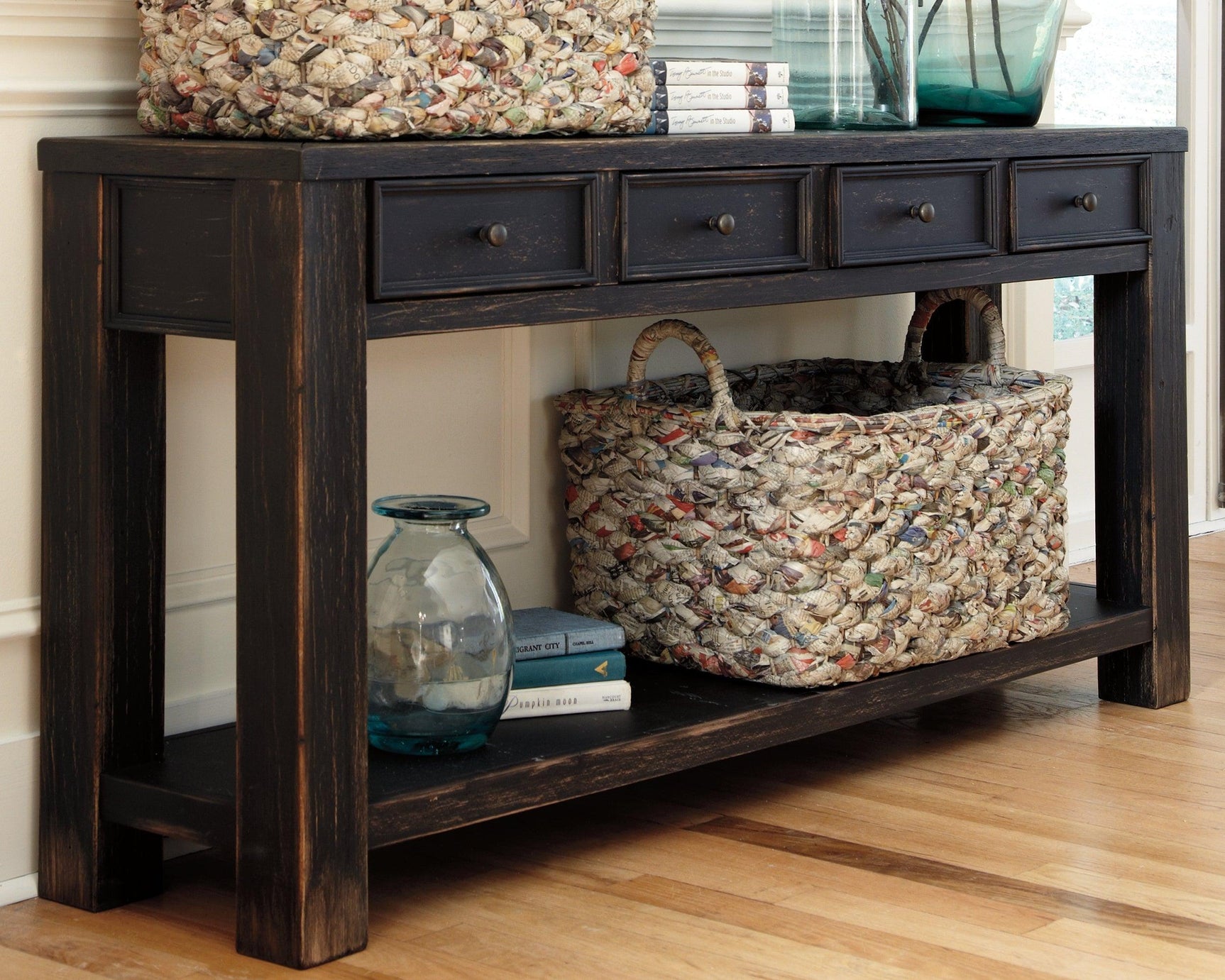 Vintage weathered black finish sofa console table with storage drawers, front close-up