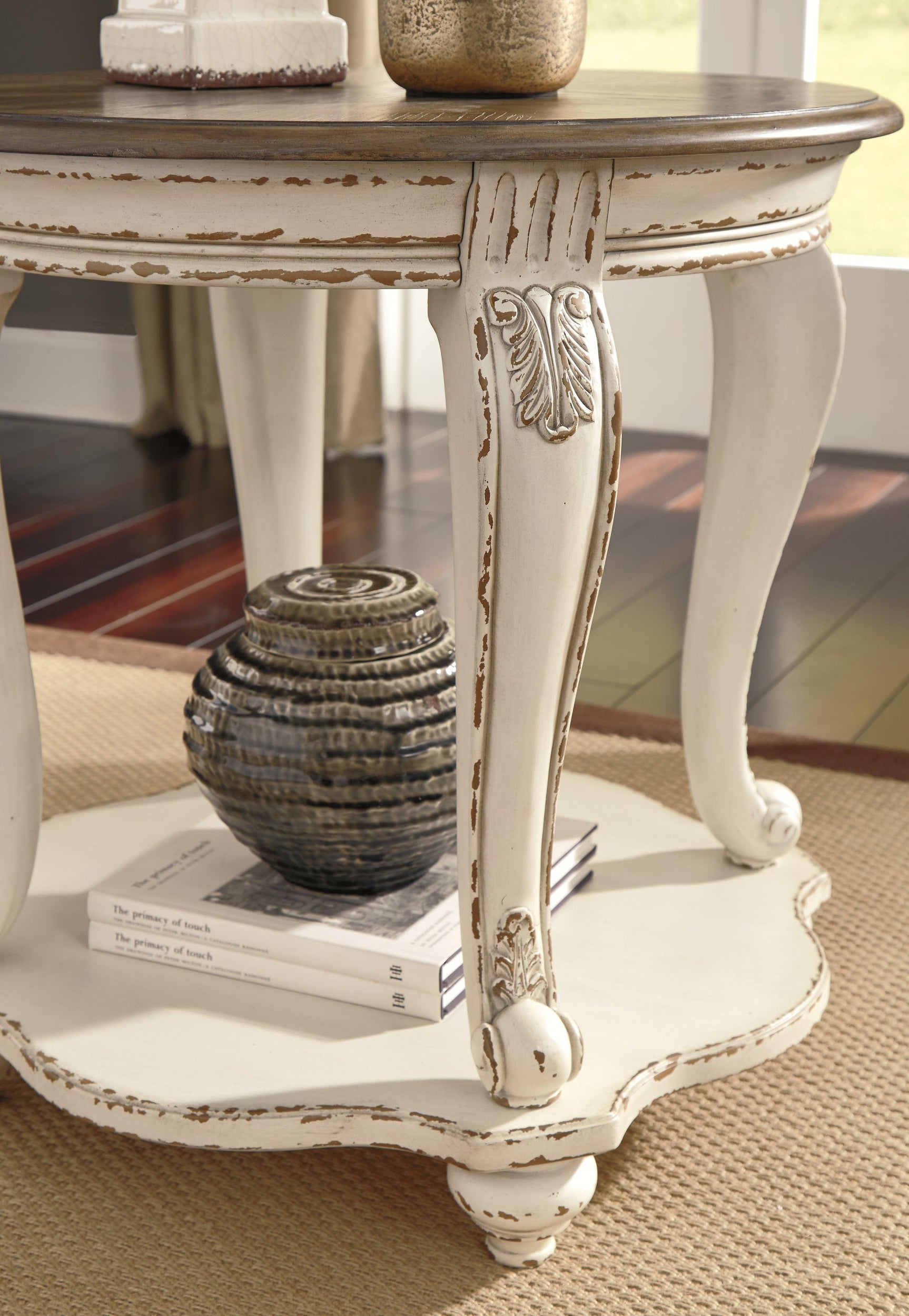 Realyn White/Brown End Table - Ella Furniture