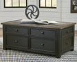Tyler Creek coffee table with weathered grayish brown lift-top in open position