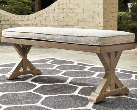 Beachcroft outdoor dining bench with beige cushion, front angle