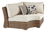 Beachcroft Beige Curved Outdoor Corner Chair front angle with cushions