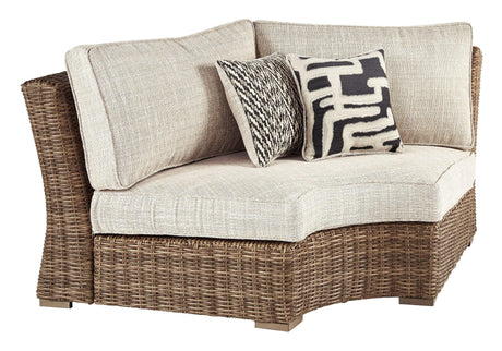 Beachcroft Beige Curved Outdoor Corner Chair front angle with cushions