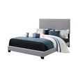 Boyd Eastern King Upholstered Bed With Nailhead Trim Charcoal - Ella Furniture