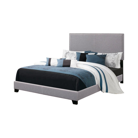 Boyd Eastern King Upholstered Bed With Nailhead Trim Charcoal - Ella Furniture