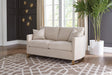 Corliss Upholstered Arched Arms Loveseat Beige - Ella Furniture