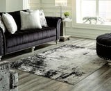 Zekeman Black/cream/gray 7'10" X 10' Rug - Ella Furniture