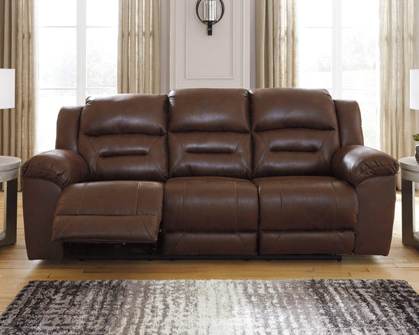 Stoneland Chocolate Faux Leather Power Reclining Sofa - Ella Furniture