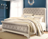 Realyn Chipped White Queen Sleigh Bed - Ella Furniture