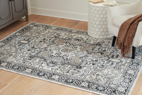 Gregmoore Multi 5'2" X 6'10" Rug - Ella Furniture